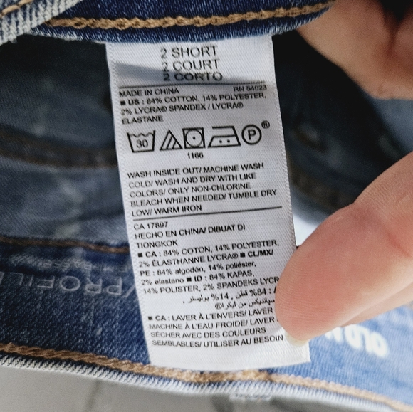 OLD NAVY | curvy mid rise bleached hearts spiderweb happy face design boot jeans - Picture 7 of 7